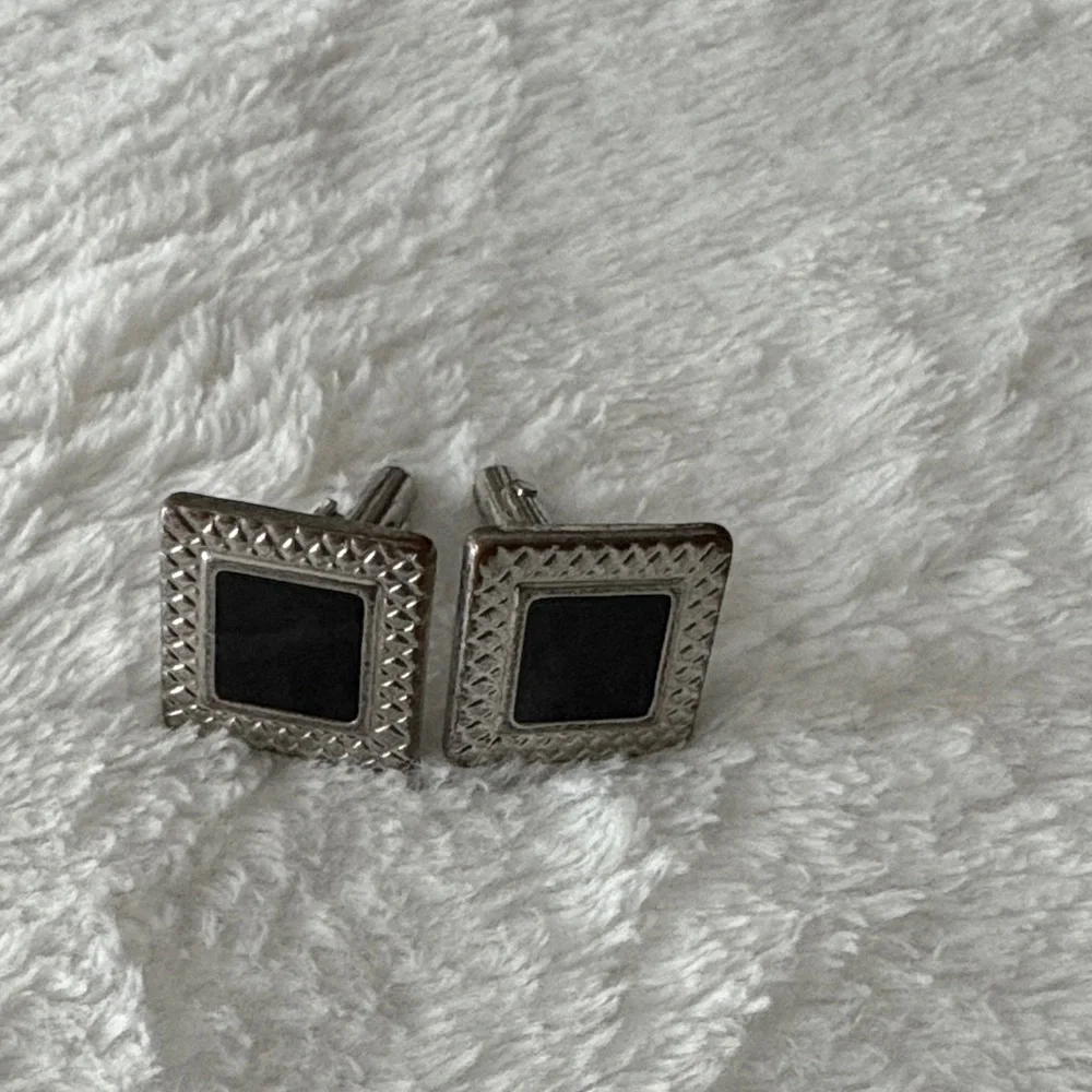 Elegant Silver and Black Cufflinks